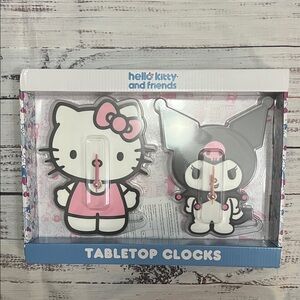 Sanrio Hello Kitty and Kuromi tabletop clocks.